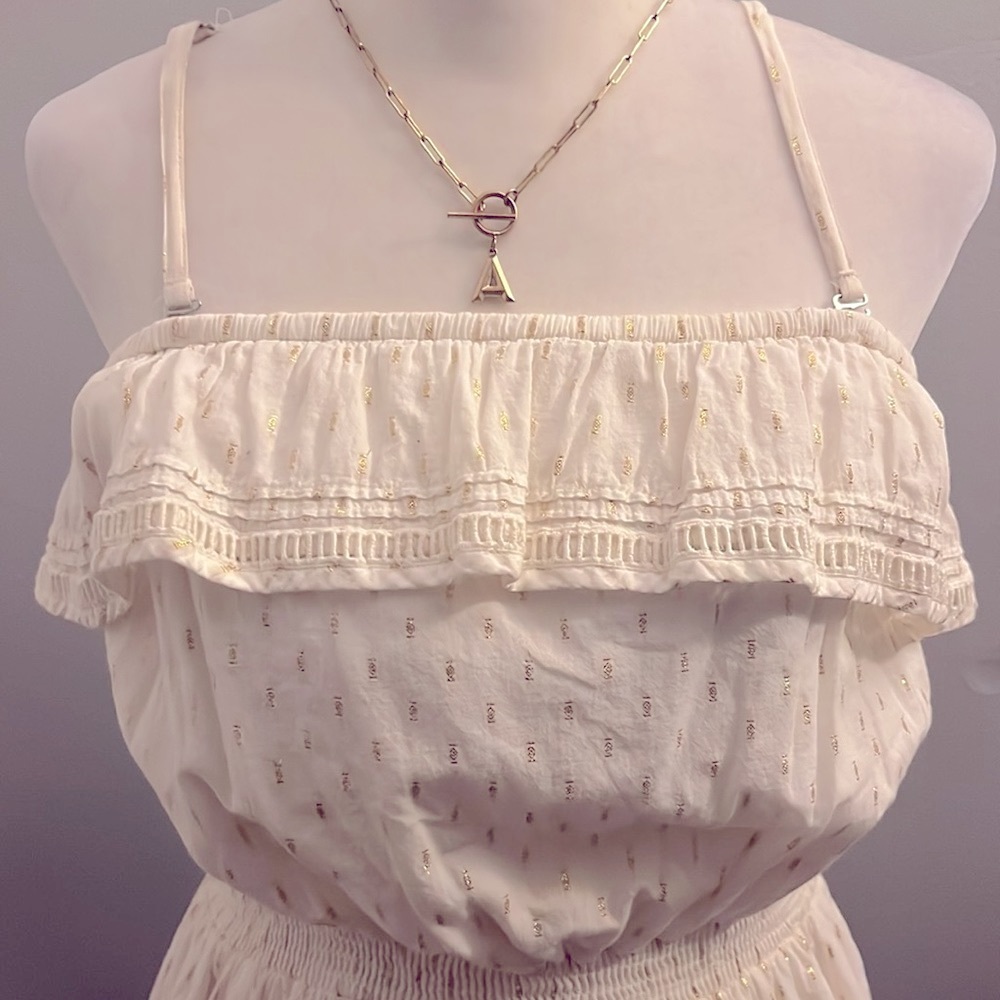 White Express dress size medium with gold details